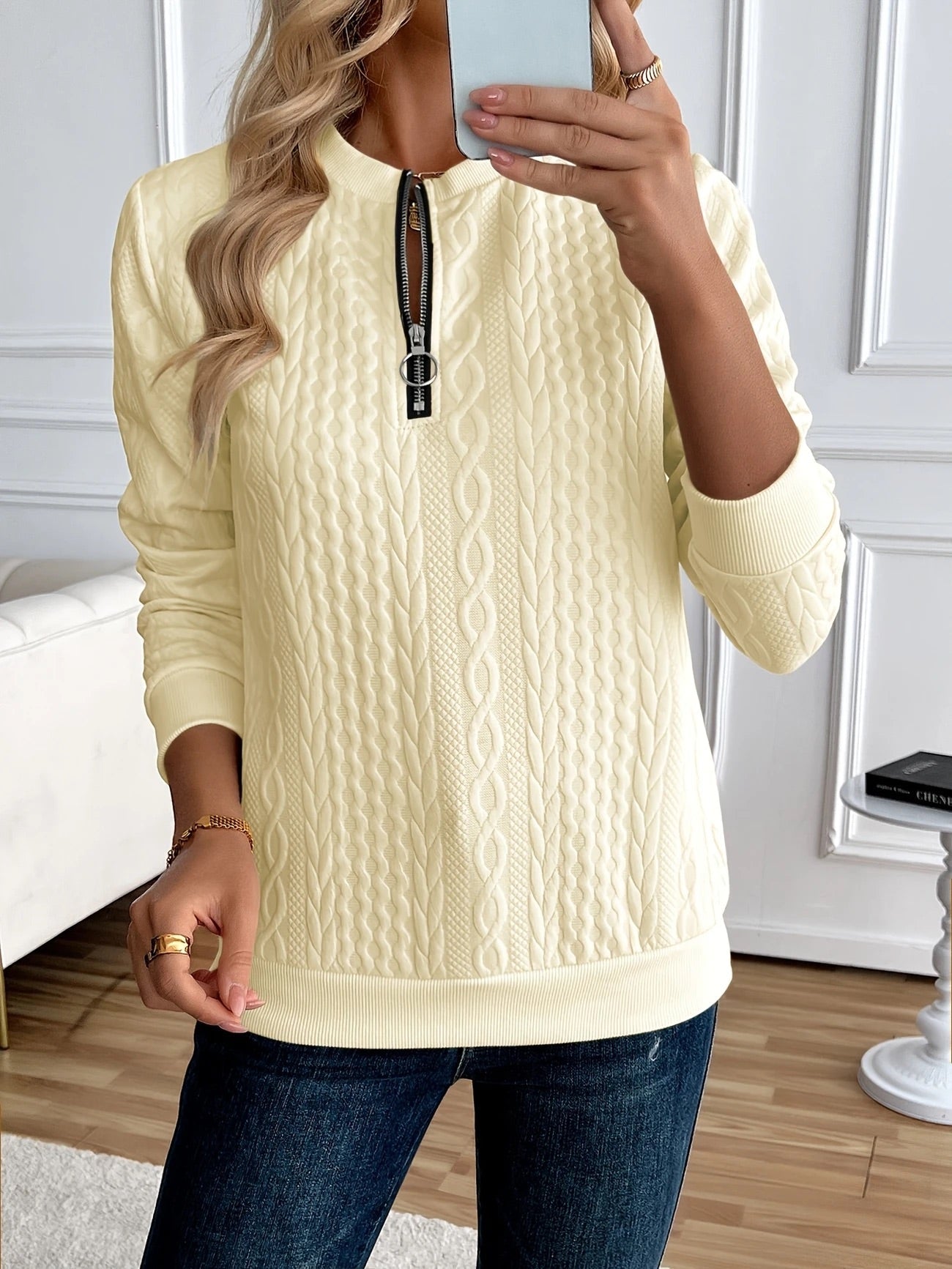 Woman wearing the Gastown Textured Zip Sweatshirt in cream