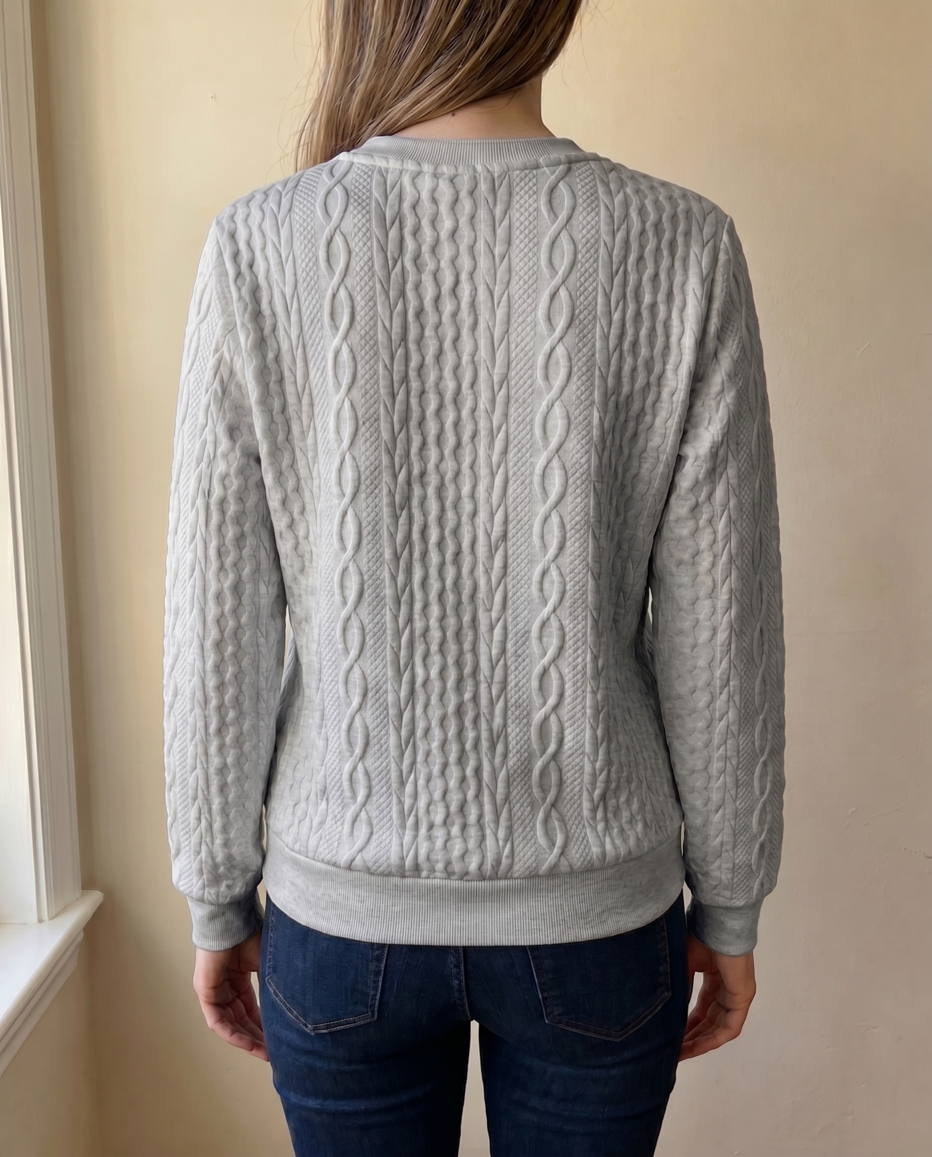 Close-up of the textured back of the grey Gastown Textured Zip Sweatshirt