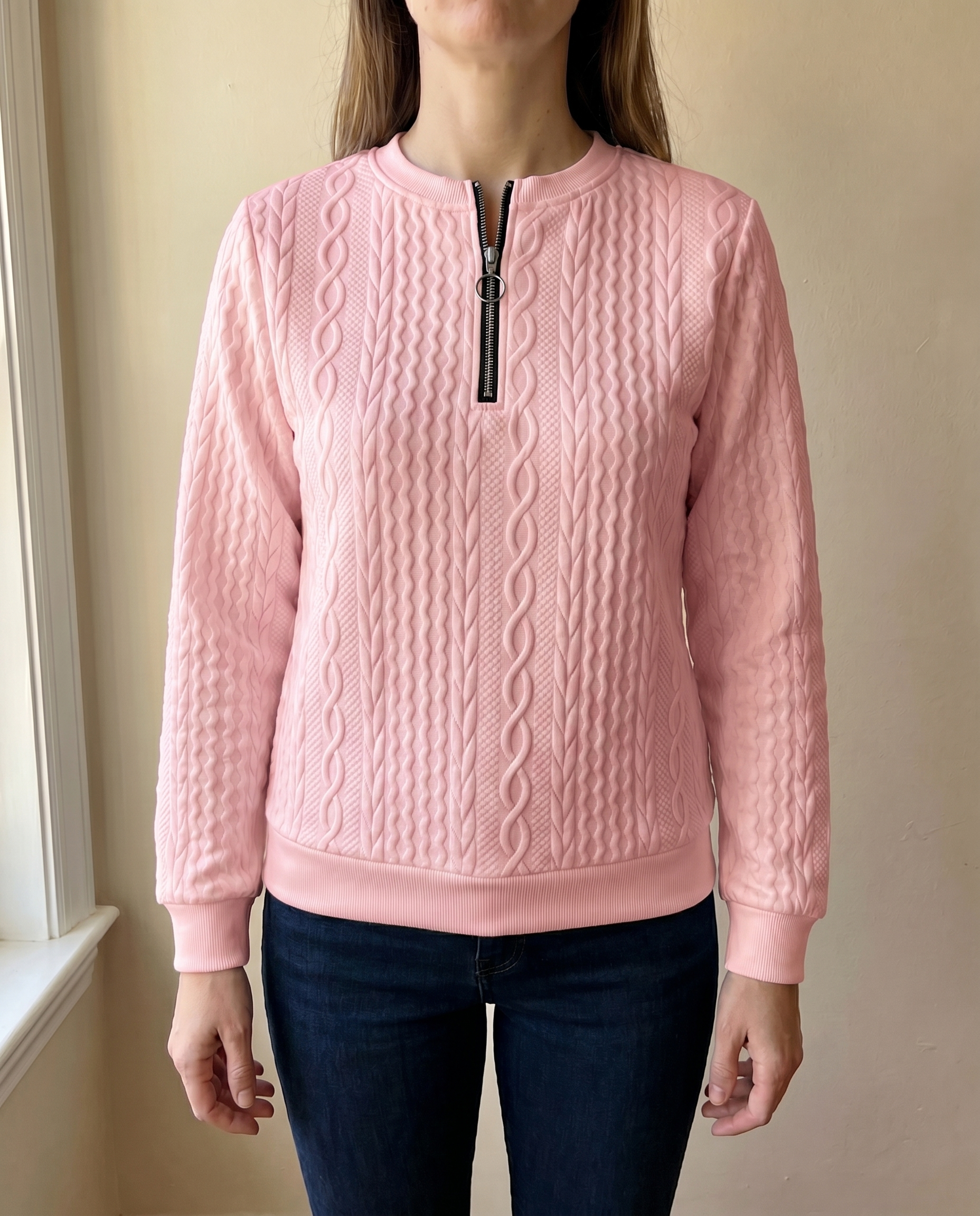 Close-up of the high zip neck on the pink Gastown Textured Zip Sweatshirt