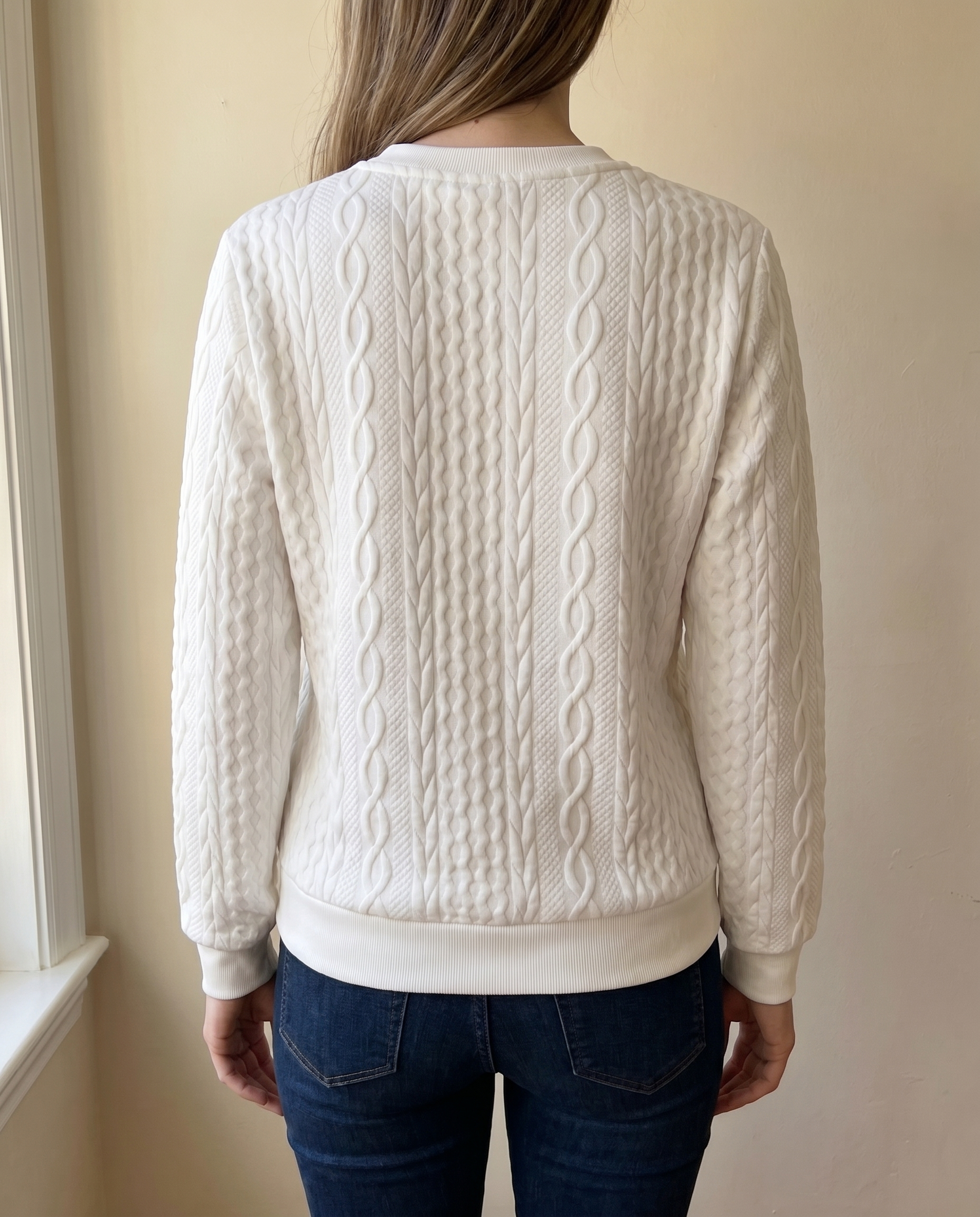 Close-up of the textured back of the white Gastown Textured Zip Sweatshirt