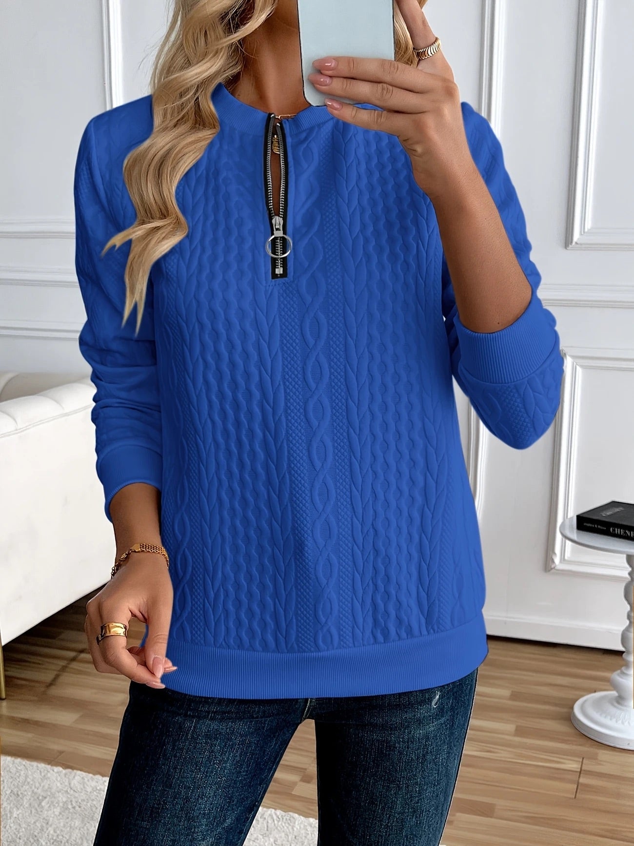 Woman wearing the Gastown Textured Zip Sweatshirt in blue