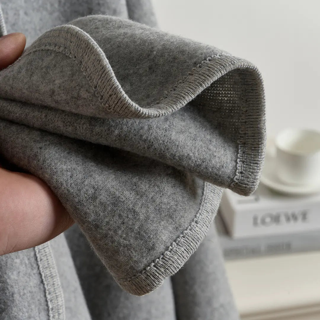 Fleece Drape Wrap, close view of the whipstitched edge