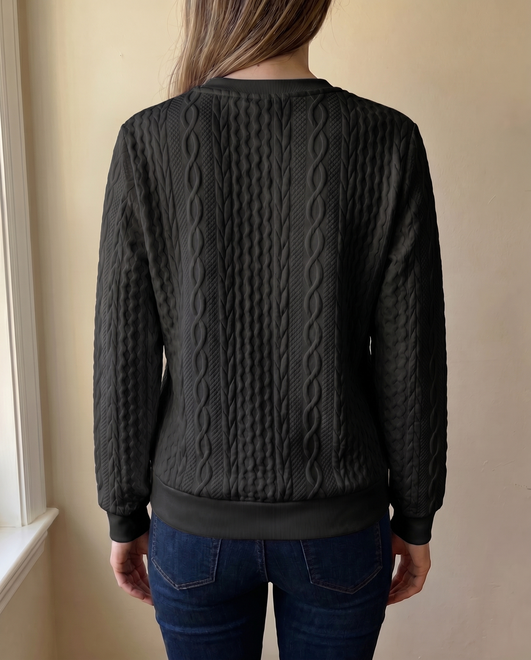 Close-up of the textured back of the black Gastown Textured Zip Sweatshirt