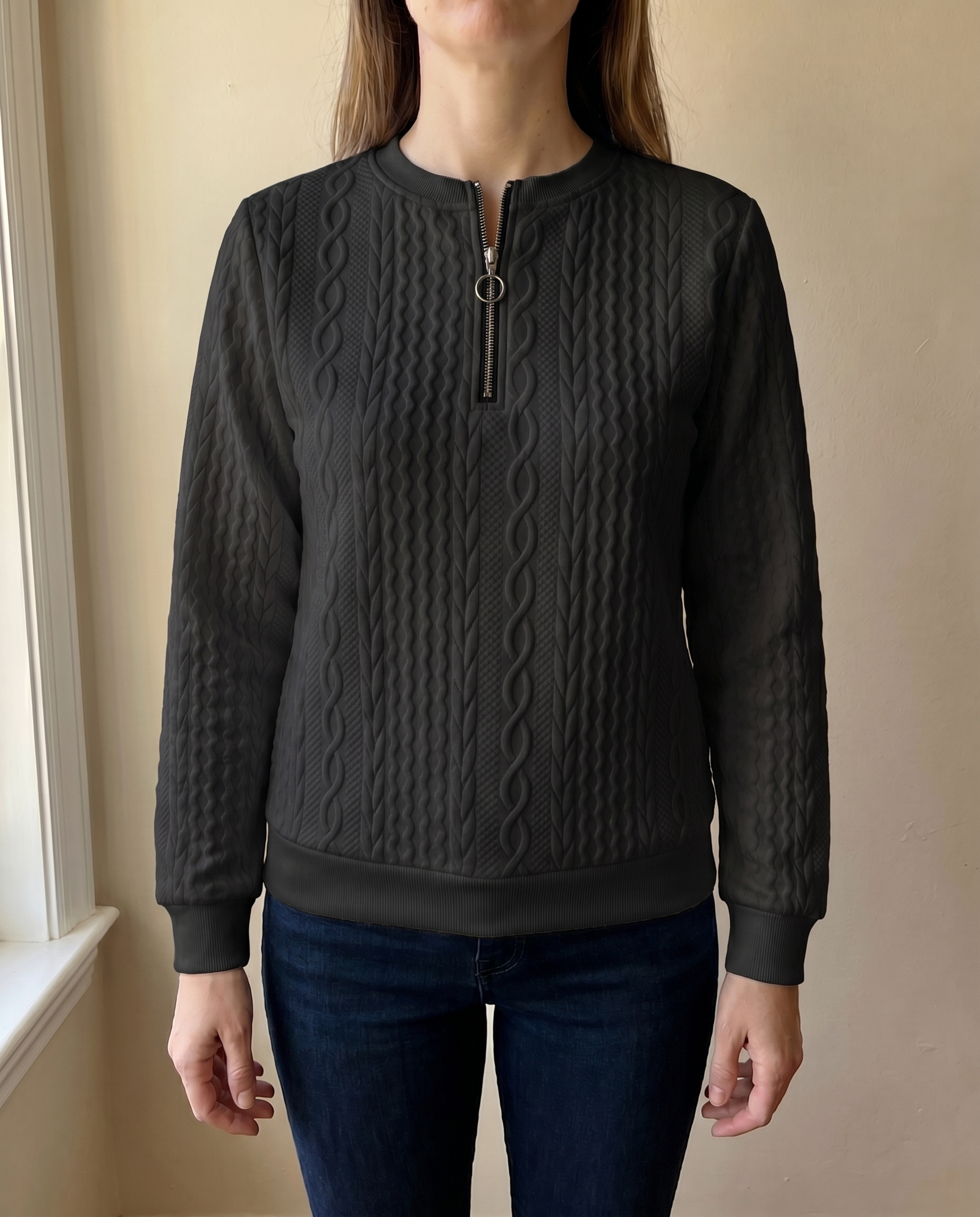 Close-up of the high zip neck on the black Gastown Textured Zip Sweatshirt