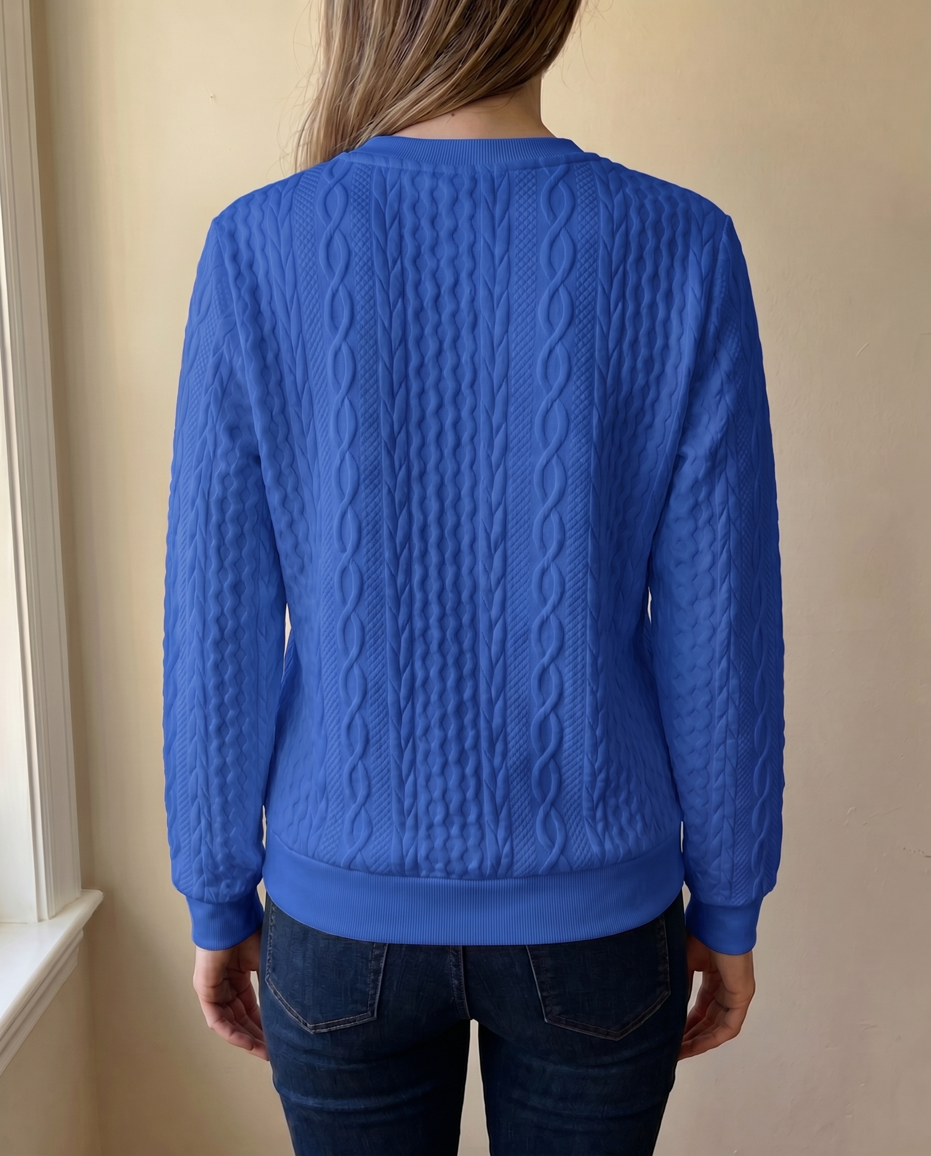 Close-up of the textured back of the blue Gastown Textured Zip Sweatshirt