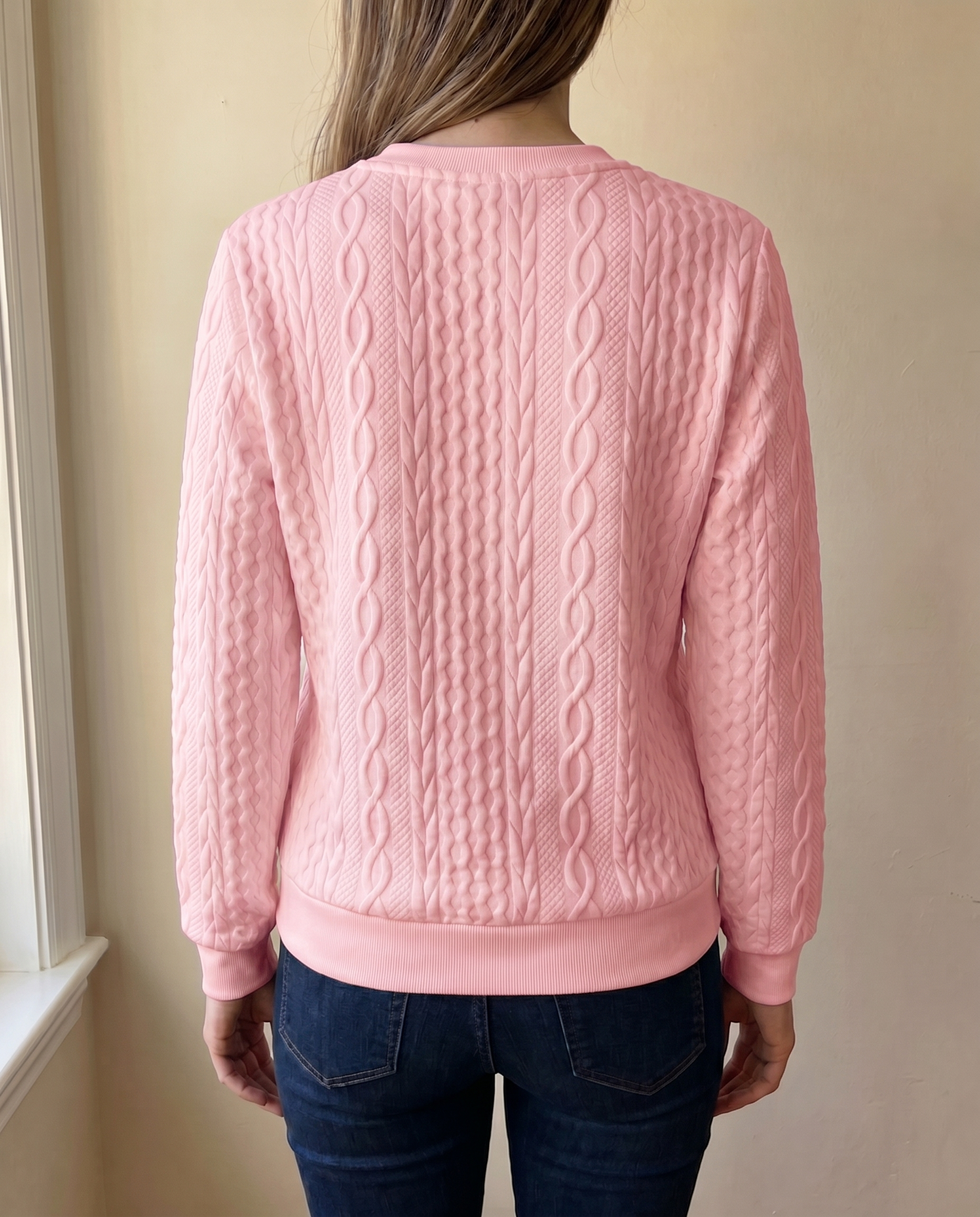 Close-up of the textured back of the pink Gastown Textured Zip Sweatshirt